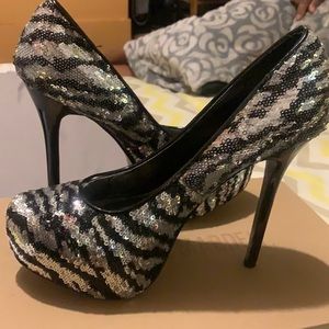 Black and silver pumps